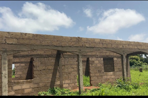 A symbol of  hope and struggle; The unfinished school structure of Youngduuni